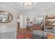 Open-concept living space with views into additional rooms, neutral walls, and hardwood floors at 3524 Johnny Cake Ln, Charlotte, NC 28226