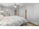 Spacious main bedroom featuring plush carpet, ceiling fan and multiple closets at 3524 Johnny Cake Ln, Charlotte, NC 28226