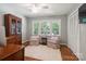 Cozy office space with plush rug, bright natural light, and a pair of accent chairs at 3524 Johnny Cake Ln, Charlotte, NC 28226