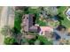 Bird's-eye view of a well-kept home with a long driveway and mature trees in a green neighborhood at 3730 Club House Ne Dr, Conover, NC 28613