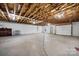 Spacious unfinished basement with exposed ceiling and concrete floors, offering plenty of space at 3730 Club House Ne Dr, Conover, NC 28613