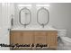 Modern bathroom with a double vanity, stylish mirrors, and sleek hardware at 3730 Club House Ne Dr, Conover, NC 28613