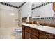 Outdated bathroom featuring a combination tub and shower, vanity, and toilet at 3730 Club House Ne Dr, Conover, NC 28613