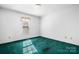 Bright bedroom features green carpet, white walls, and a window with natural light at 3730 Club House Ne Dr, Conover, NC 28613