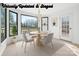 Bright dining room with a modern chandelier, large windows, and a cozy dining set at 3730 Club House Ne Dr, Conover, NC 28613