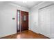 Inviting entryway featuring a decorative wood door, tile floor, and a closet at 3730 Club House Ne Dr, Conover, NC 28613
