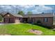 Lovely brick home featuring a well-maintained lawn and a two-car attached garage at 3730 Club House Ne Dr, Conover, NC 28613
