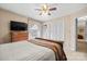 Cozy bedroom featuring neutral paint, ceiling fan and closet at 409 Cardinal Dr, Newton, NC 28658