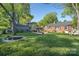 Spacious backyard featuring a pond and fire pit, perfect for outdoor entertaining and relaxation at 412 W D Ave, Salisbury, NC 28144