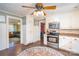 Modern kitchen with stainless steel appliances and plenty of storage, seamlessly connected to the living room at 412 W D Ave, Salisbury, NC 28144