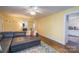 Cozy living room with hardwood floors and open layout, ideal for relaxation and entertaining at 412 W D Ave, Salisbury, NC 28144