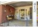 Charming front porch with table and chairs, ideal for enjoying morning coffee or evening relaxation at 412 W D Ave, Salisbury, NC 28144