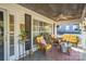Cozy front porch with comfortable seating and ceiling fan, great for entertaining guests at 412 W D Ave, Salisbury, NC 28144