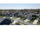 Expansive aerial view of a peaceful residential neighborhood with tree-lined streets and well-maintained homes at 4425 Marlay Park, Indian Trail, NC 28079