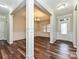 Bright dining room with hardwood floors, elegant chandelier, and stylish wainscoting details at 4425 Marlay Park, Indian Trail, NC 28079