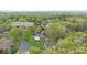 Aerial view of a home nestled in a tree-filled neighborhood, near Winding Brook Rd at 5125 Winding Brook Rd, Charlotte, NC 28226