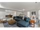 Spacious basement featuring a pool table, wet bar, and living room seating perfect for entertaining at 5125 Winding Brook Rd, Charlotte, NC 28226