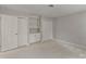 Bedroom with carpet flooring, built in storage, and a large closet at 5125 Winding Brook Rd, Charlotte, NC 28226