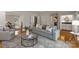 Bright living room with hardwood floors and contemporary furnishings at 5125 Winding Brook Rd, Charlotte, NC 28226