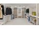 Walk-in closet with built in shelves and hanging space to store all your clothes at 5125 Winding Brook Rd, Charlotte, NC 28226