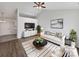 Bright living room with neutral walls, modern furniture, and a cozy rug creating a relaxing atmosphere at 5407 Windy Valley Dr, Charlotte, NC 28208