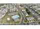 Aerial view of the community showcasing the pool, clubhouse, parking, and residential streets at 5622 Dartington Dr, Indian Land, SC 29707