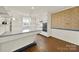 Kitchen with vintage design details, white cabinets, and built-in oven at 5876 Wedgewood Dr, Charlotte, NC 28210