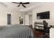 The main bedroom boasts wood floors and neutral walls, creating a serene atmosphere for relaxation and sleep at 5951 Carrollton Ln, Charlotte, NC 28210