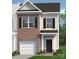Charming two-story home with brick accents, a garage, and manicured landscaping at 6029 Jasmine Branch Rd, Charlotte, NC 28216
