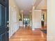 Spacious entryway with hardwood floors and elegant trim at 6144 Abergele Ln, Matthews, NC 28104