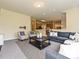 Inviting living room with cozy seating and seamless access to the kitchen at 6144 Abergele Ln, Matthews, NC 28104