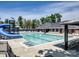 Large community swimming pool with slide and lounge chairs at 6144 Abergele Ln, Matthews, NC 28104