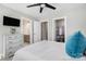 Bedroom with large bed, dresser, and ensuite bathroom and walk-in closet doors at 6529 Jepson Ct, Charlotte, NC 28214