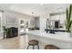 Modern kitchen with a white island, stainless steel appliances, and an open layout at 6529 Jepson Ct, Charlotte, NC 28214