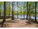 Beautiful lakefront area with picnic tables and scenic views, perfect for outdoor enjoyment at 6529 Jepson Ct, Charlotte, NC 28214