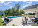 Backyard with a large pool, lounge area, and outdoor living space at 6529 Jepson Ct, Charlotte, NC 28214