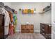 Well-organized walk-in closet with shelving, hanging rods, and ample storage space at 6529 Jepson Ct, Charlotte, NC 28214
