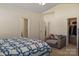 Bright bedroom features carpeted floor, comfortable chair and a closet at 6816 Pennyroyal Way, Charlotte, NC 28216