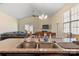Spacious open-concept kitchen with granite countertops, stainless steel sink and nearby living area at 6816 Pennyroyal Way, Charlotte, NC 28216