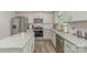 Charming kitchen offering granite countertops, stainless steel appliances, and center island at 715 Saddlebred Ln, Locust, NC 28097