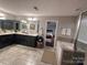 Spacious bathroom boasting double vanity, soaking tub and separate shower, and entry to main bedroom at 8011 Caliterra Dr, Charlotte, NC 28227