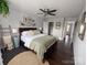 Bedroom featuring decor, a ceiling fan, and closet space at 8011 Caliterra Dr, Charlotte, NC 28227