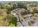 A suburban community featuring tree-lined streets and meticulously maintained townhomes with ample parking at 8230 Rudolph Rd, Charlotte, NC 28216