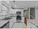 Bright kitchen boasts stainless appliances, granite countertops, and subway tile backsplash at 8230 Rudolph Rd, Charlotte, NC 28216