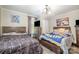 Bedroom featuring two beds, neutral walls, and wood-look flooring at 1013 East Dr, Gastonia, NC 28052