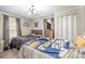 This bedroom features neutral walls, wood floors, two beds, and natural light at 1013 East Dr, Gastonia, NC 28052