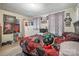 Bedroom featuring neutral walls, wood-look flooring and ample natural light at 1013 East Dr, Gastonia, NC 28052