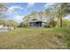This house has a small front porch and green lawn with a few trees at 1013 East Dr, Gastonia, NC 28052