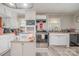 Bright kitchen featuring overhead lighting and granite countertops at 1013 East Dr, Gastonia, NC 28052
