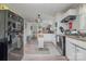 Well lit kitchen with stainless steel appliances and wood grain flooring at 1013 East Dr, Gastonia, NC 28052